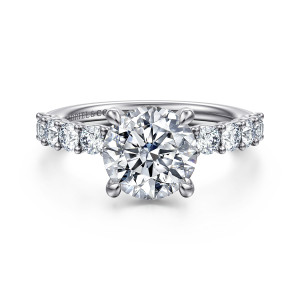 Gabriel & Co. ER16755R8W44JJ 14 karat white gold Contemporary engagement ring, front view of a round center beside spaced round diamonds held in small shared prongs