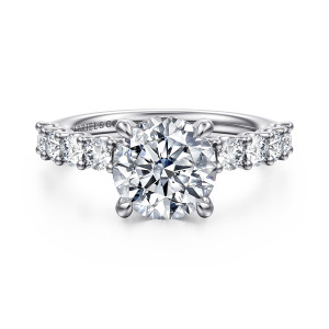 Gabriel & Co. ER16756R8W44JJ 14 karat white gold Contemporary engagement ring, front view of a round center with round diamonds lined up along both shoulders