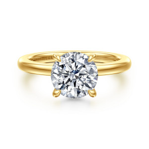 Gabriel & Co. ER16787R8Y44JJ 14 karat yellow gold Bujukan engagement ring, front view of a round center held by four leaf shaped prongs above a smooth plain band