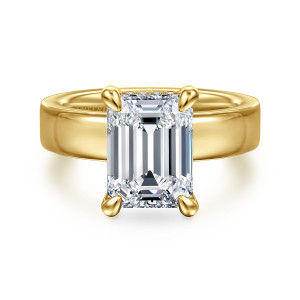 Gabriel & Co. ER16854E16Y44JJ 14 karat yellow gold Classic engagement ring, front view of an emerald cut center in four corner claws on a broad band
