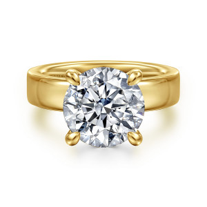 Gabriel & Co. ER16854R16Y44JJ 14 karat yellow gold Classic engagement ring, front view of a round center with four teardrop tipped prongs against a broad polished band