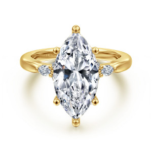 Gabriel & Co. ER16855M16Y44JJ 14 karat yellow gold Starlight engagement ring, front view of a marquise center with ball tipped prongs and small stones beside the head