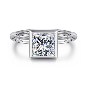 Gabriel & Co. ER16857S6W44JJ 14 karat white gold Contemporary engagement ring, front view of a square bezel frame around a princess cut center with stone groups at each side