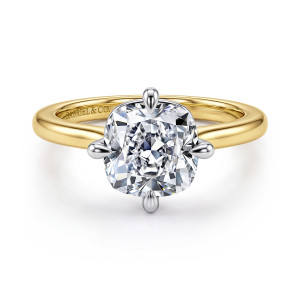 Gabriel & Co. ER16858C12M4JJJ 14 karat white and yellow gold Contemporary engagement ring, front view of a cushion center held by four teardrop tipped prongs at the middle of each side