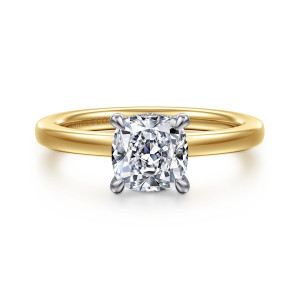 Gabriel & Co. ER16860C6M44JJ 14 karat white and yellow gold Classic engagement ring, front view of a cushion cut center on slender pointed prongs with a plain polished band behind