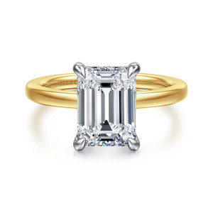 Gabriel & Co. ER16860E12M44JJ 14 karat white and yellow gold Classic engagement ring, front view of an emerald cut center on four teardrop prongs above a smooth warm band