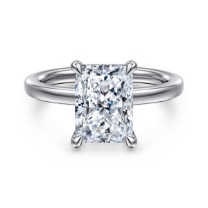 Gabriel & Co. ER16860N12W44JJ 14 karat white gold Classic engagement ring, front view of a radiant cut center in four teardrop prongs with tiny stones under its top edge