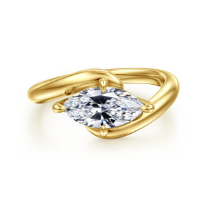 Gabriel & Co. ER16873M5Y4JJJ 14 karat yellow gold Contemporary engagement ring, top view of a marquise center laid crosswise with two band arms sweeping past each other