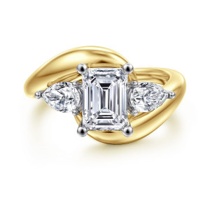Gabriel & Co. ER16892E6M44JJ 14 karat white and yellow gold Contemporary engagement ring, front view of an emerald cut center with pear shaped side stones pointing outward