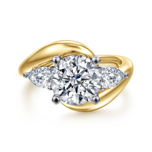 Gabriel & Co. ER16892R10M44JJ 14 karat white and yellow gold Contemporary engagement ring, front view of a round center flanked by pear shaped diamonds with points aimed outward