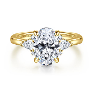 Gabriel & Co. ER16893O8Y44JJ 14 karat yellow gold Lotus engagement ring, front view of pear shaped side diamonds with small round diamonds beside an oval center