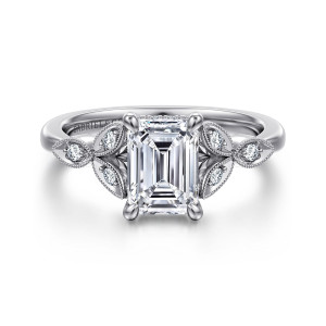 Gabriel & Co. ER16895E6W44JJ 14 karat white gold Victorian engagement ring, front view of an emerald cut center with corner prongs and beaded leaf motifs on both shoulders