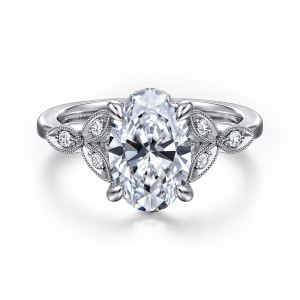 Gabriel & Co. ER16895O8W44JJ 14 karat white gold Victorian engagement ring, front view of the oval center between leaf shaped beaded panels holding small diamonds