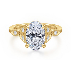 Gabriel & Co. ER16895O8Y44JJ 14 karat yellow gold Victorian engagement ring, front view of an oval center with teardrop tipped claws and beaded leaf frames at each side