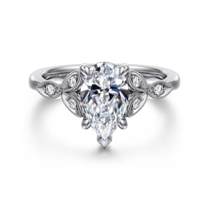 Gabriel & Co. ER16895P6W44JJ 14 karat white gold Victorian engagement ring, front view of a pear shaped center flanked by beaded leaf frames each holding a small diamond