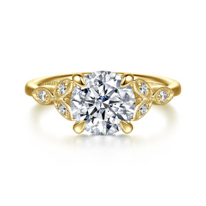 Gabriel & Co. ER16895R8Y44JJ 14 karat yellow gold Victorian engagement ring, front view of the round center flanked by beaded leaf frames of small diamonds spreading like wings