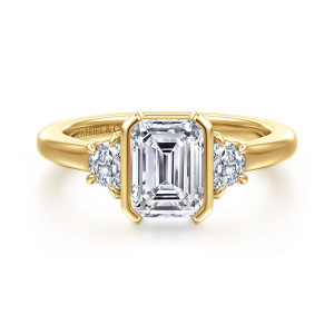 Gabriel & Co. ER16908E6Y43JJ 14 karat yellow gold Contemporary engagement ring, front view of an emerald cut center between straight bezel walls and half moon stones