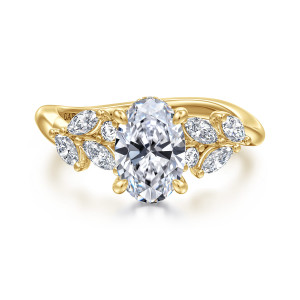 Gabriel & Co. ER16910O6Y44JJ 14 karat yellow gold Floral Nouveau engagement ring, front view of an oval center with leaf like clusters of stones sweeping across both shoulders