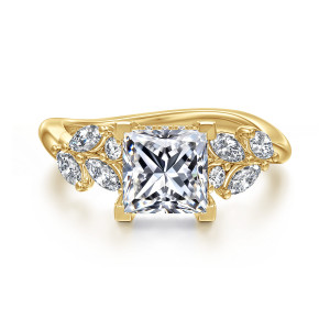 Gabriel & Co. ER16910S6Y44JJ 14 karat yellow gold Floral Nouveau engagement ring, front view of a princess cut center between leaf shaped clusters on a sweeping band