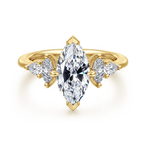 Gabriel & Co. ER16911M6Y44JJ 14 karat yellow gold Contemporary engagement ring, front view of a marquise center with pointed tip prongs and paired elongated stones on each side