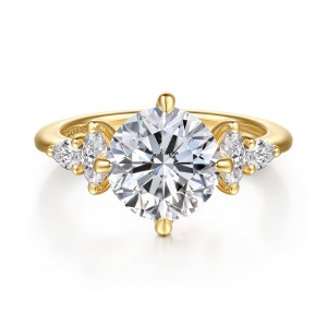 Gabriel & Co. ER16911R12Y44JJ 14 karat yellow gold Contemporary engagement ring, front view of a round center held at four compass points between elongated side stones