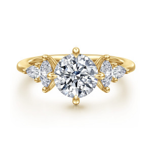 Gabriel & Co. ER16911R6Y44JJ 14 karat yellow gold Contemporary engagement ring, front view of a round center, prongs at top and sides, and elongated stones on each shoulder