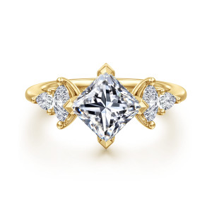 Gabriel & Co. ER16911S6Y44JJ 14 karat yellow gold Contemporary engagement ring, front view of the princess cut turned on its points with elongated stones at each side