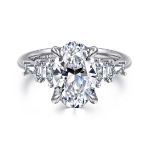 Gabriel & Co. ER16912O12W43JJ 14 karat white gold Classic engagement ring, front view of an oval center with a row of tapered stones stepping down each side