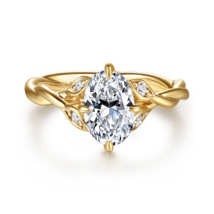 Gabriel & Co. ER16917O6Y44JJ 14 karat yellow gold Contemporary engagement ring, front view of an oval center with leaf shaped diamond settings at each shoulder