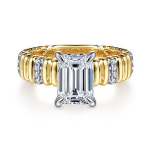 Gabriel & Co. ER16929E8M44JJ 14 karat white and yellow gold Contemporary engagement ring, front view of an emerald cut center in corner prongs above a ribbed band with diamond bars