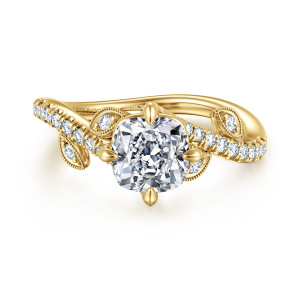 Gabriel & Co. ER16932C6Y44JJ 14 karat yellow gold Floral Nouveau engagement ring, top view of a cushion center with leaf frames beside the head and diamonds on the sweeping band