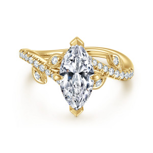 Gabriel & Co. ER16932M6Y44JJ 14 karat yellow gold Floral Nouveau engagement ring, front view of a marquise center with pointed tip prongs and shank ends passing each other