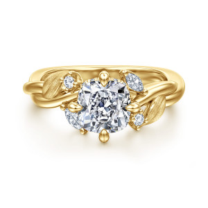 Gabriel & Co. ER16933C6Y44JJ 14 karat yellow gold Floral Nouveau engagement ring, front view of a cushion cut center with brushed leaves and small stones along the twisting band