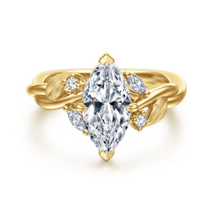 Gabriel & Co. ER16933M6Y44JJ 14 karat yellow gold Floral Nouveau engagement ring, front view of a marquise center with pointed end prongs and brushed leaves beside the head