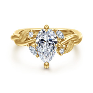 Gabriel & Co. ER16933P6Y44JJ 14 karat yellow gold Floral Nouveau engagement ring, front view of a pear shaped center with brushed leaves and small diamonds around the head