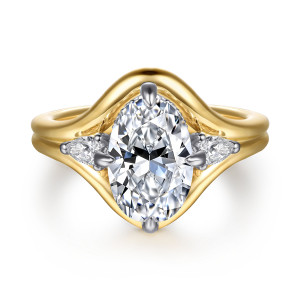 Gabriel & Co. ER16934O8M44JJ 14 karat white and yellow gold Contemporary engagement ring, front view of an oval center flanked by pear shaped stones inside a sweeping split band