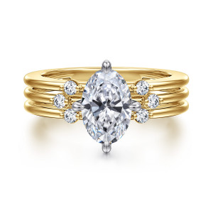 Gabriel & Co. ER16951O6M44JJ 14 karat white and yellow gold Contemporary engagement ring, front view of the oval center between shoulder clusters of small round diamonds on a ribbed band