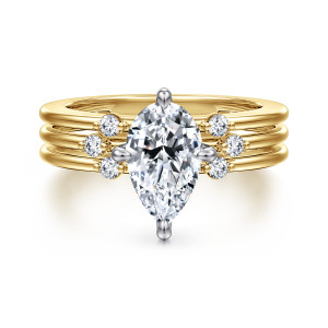 Gabriel & Co. ER16951P6M44JJ 14 karat white and yellow gold Contemporary engagement ring, front view of a pear shaped center above parallel strands with small stones in a chevron