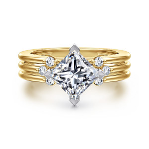 Gabriel & Co. ER16951S6M44JJ 14 karat white and yellow gold Contemporary engagement ring, front view of a corner up princess cut center flanked by small round stones on the rails