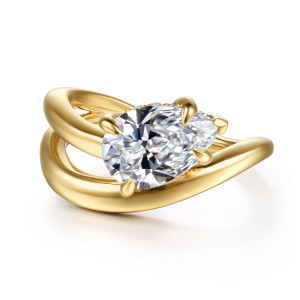 Gabriel & Co. ER16952P8Y44JJ 14 karat yellow gold Contemporary engagement ring, top view of the pear shaped center lying sideways between smooth crossing arms