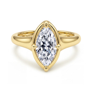 Gabriel & Co. ER16955M6Y4JJJ 14 karat yellow gold Contemporary engagement ring, front view of the marquise center inside its pointed collar with tipped prongs at both ends