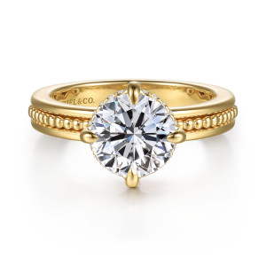 Gabriel & Co. ER16957R8Y44JJ 14 karat yellow gold Bujukan engagement ring, front view of a round center in prongs at the compass points and small diamonds at its edge