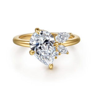 Gabriel & Co. ER16960P8Y44JJ 14 karat yellow gold Starlight engagement ring, front view of a tilted pear shaped center with a small stone cluster beside the head