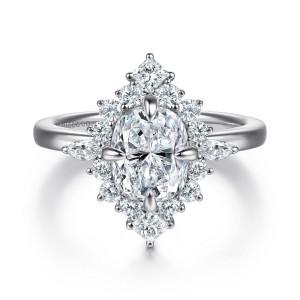 Gabriel & Co. ER16961G8W44JJ 14 karat white gold Starlight engagement ring, front view of round diamonds ringing the center between angular stones at top and bottom