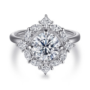 Gabriel & Co. ER16963R8W44JJ 14 karat white gold Victorian engagement ring, front view of a round center inside a star shaped halo of elongated and square stones