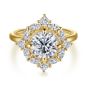 Gabriel & Co. ER16963R8Y44JJ 14 karat yellow gold Victorian engagement ring, front view of a round center inside a starburst halo of elongated and square stones