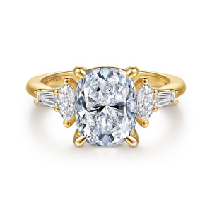 Gabriel & Co. ER16965G12Y43JJ 14 karat yellow gold Classic engagement ring, front view of an elongated cushion center with a pointed stone and a baguette on each side