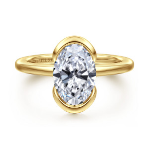Gabriel & Co. ER16974O8Y4JJJ 14 karat yellow gold Contemporary engagement ring, front view of the curved cups gripping the oval center at its top and bottom ends