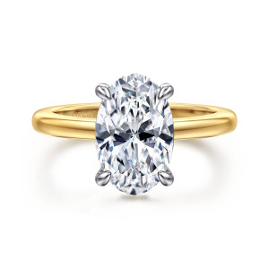 Gabriel & Co. ER16978O12M44JJ 14 karat white and yellow gold Contemporary engagement ring, front view of a tall oval center with four rounded prongs above a smooth band