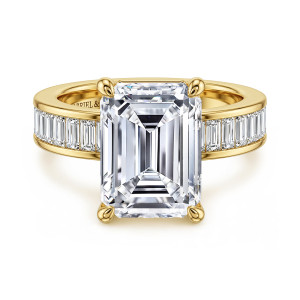 Gabriel & Co. ER16979E20Y43JJ 14 karat yellow gold Contemporary engagement ring, front view of the upright emerald cut center between rows of channel set baguette diamonds